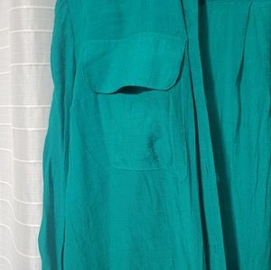 Green womens roll tab sleeve button-down shirt.